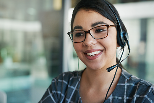 11715-3MedicareNTM-521x348 Women talking with headset on