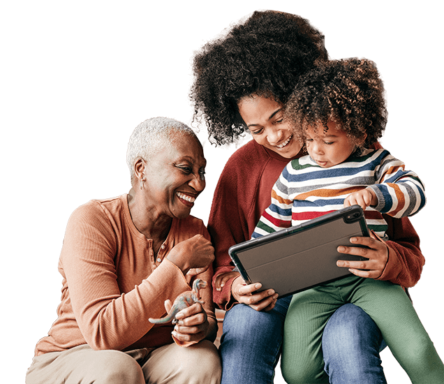 1-6-3-1-7-RenewYourCoverage Family smiling while looking at computer tablet