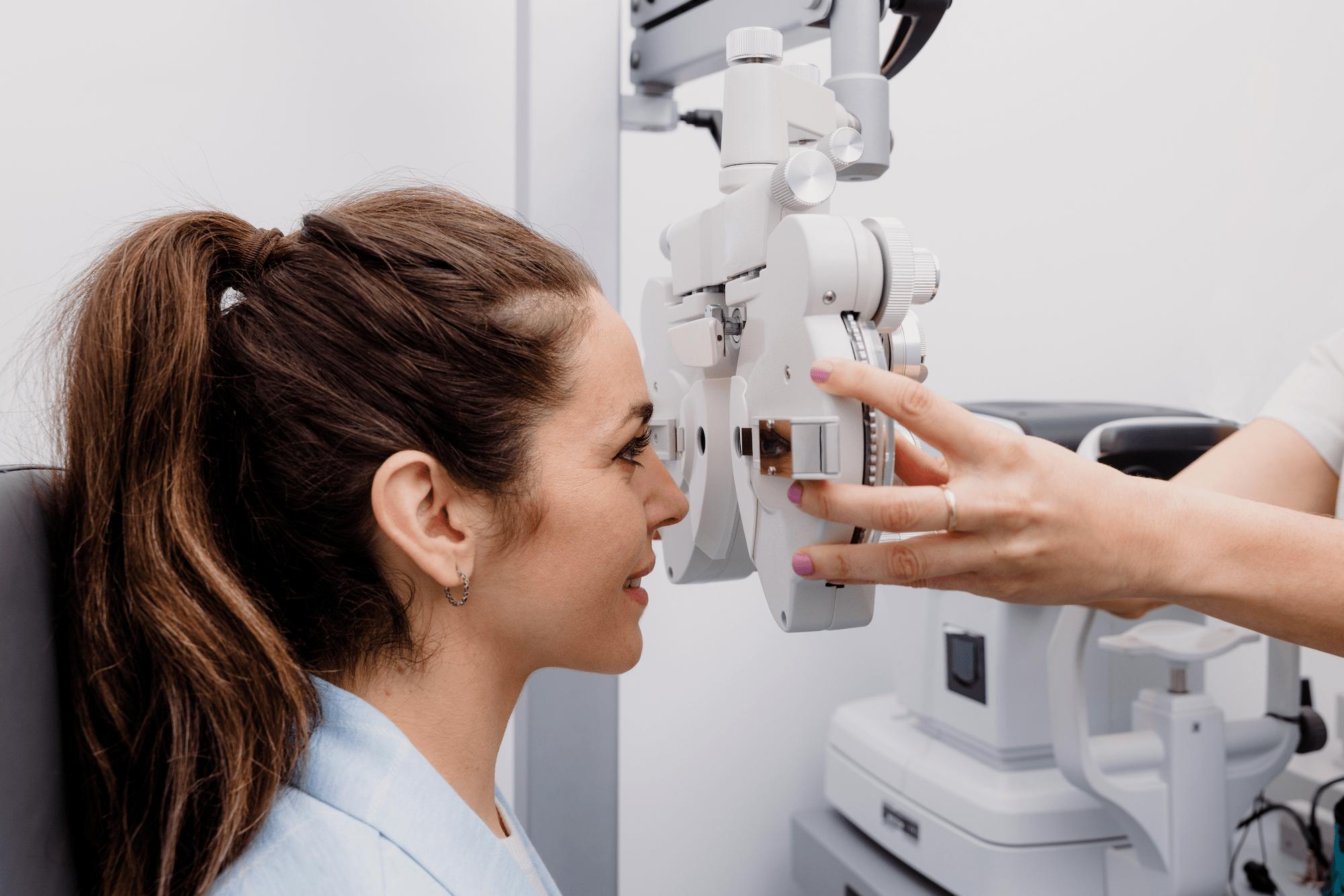 woman receiving an eye exam